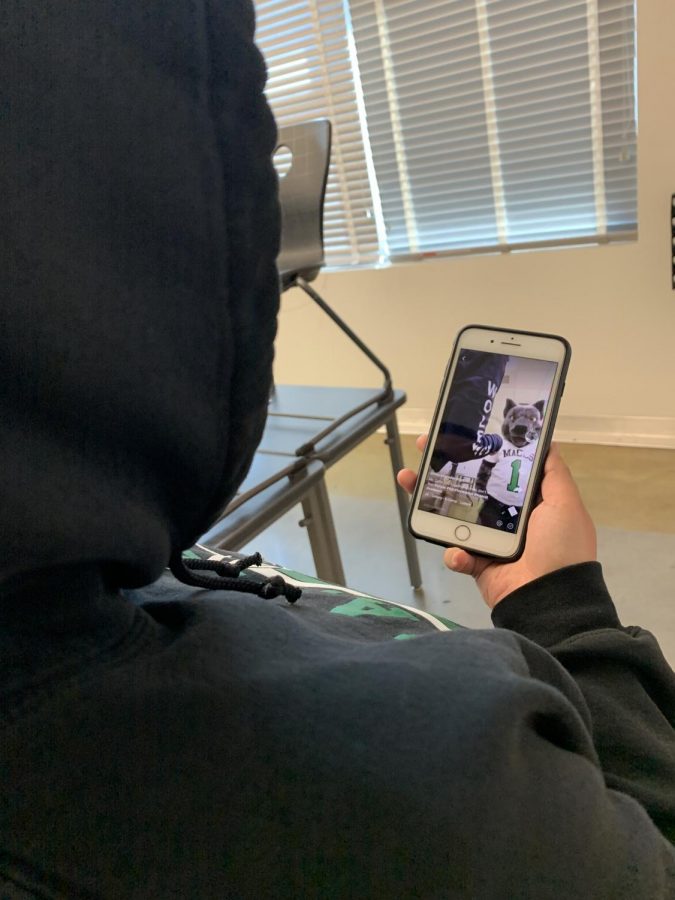MACES student viewing a tik tok during a class period. 