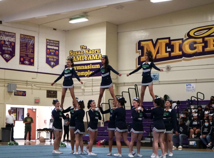 HIT! At the CIF League Cheer Championships on March 17, 2022, the MACES Cheer team performed a pyramid. The competition was held in Bell High School. “It felt like it was just the team and the mat, I was focused on the performance more than the crowd and it just felt amazing to actually show what we had been practicing for.” Destiny Morales (middle flier) a sophomore on the cheer team says. 