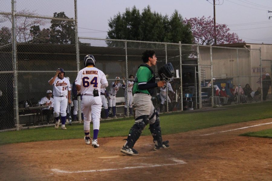 Catcher%2C+Nathan+Figueroa+communicated+with+his+team+after+they+struck+out+Bell+HS+player+%2363+during+a+non-league+game.+The+team+fell+short+in+the+sixth+inning+which+led+to+their+loss%2C+but+they+continued+to+work+on+some+mistakes+and+get+better.+%E2%80%9CTeam+chemistry+is+very+important.+It+allows+for+us+to+rely+and+feel+more+comfortable+with+each+other%2C%E2%80%9D+Figueroa+said.+