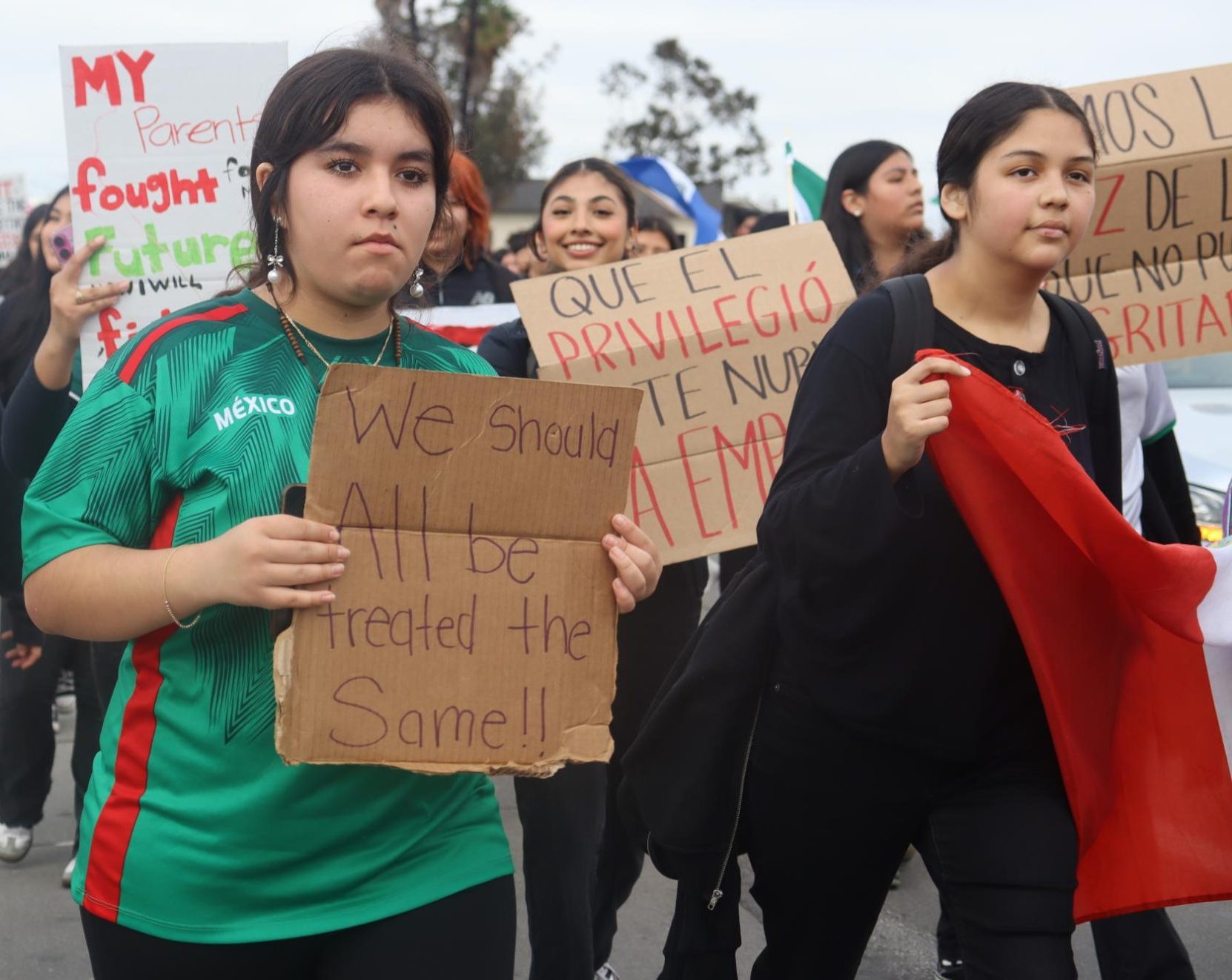 STUDENTS TAKE A STAND - On Friday, February 7, high school students protest Trump's recent deportation efforts at Azalea regional shopping center. Students from MACES, ELC, Southgate, Jordan, and Bell high school walk out of school at 11:30AM to attend.