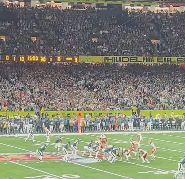 Soaring- Jalen Hurts prepares for a snap in the Eagles dominating Super Bowl 59 win.