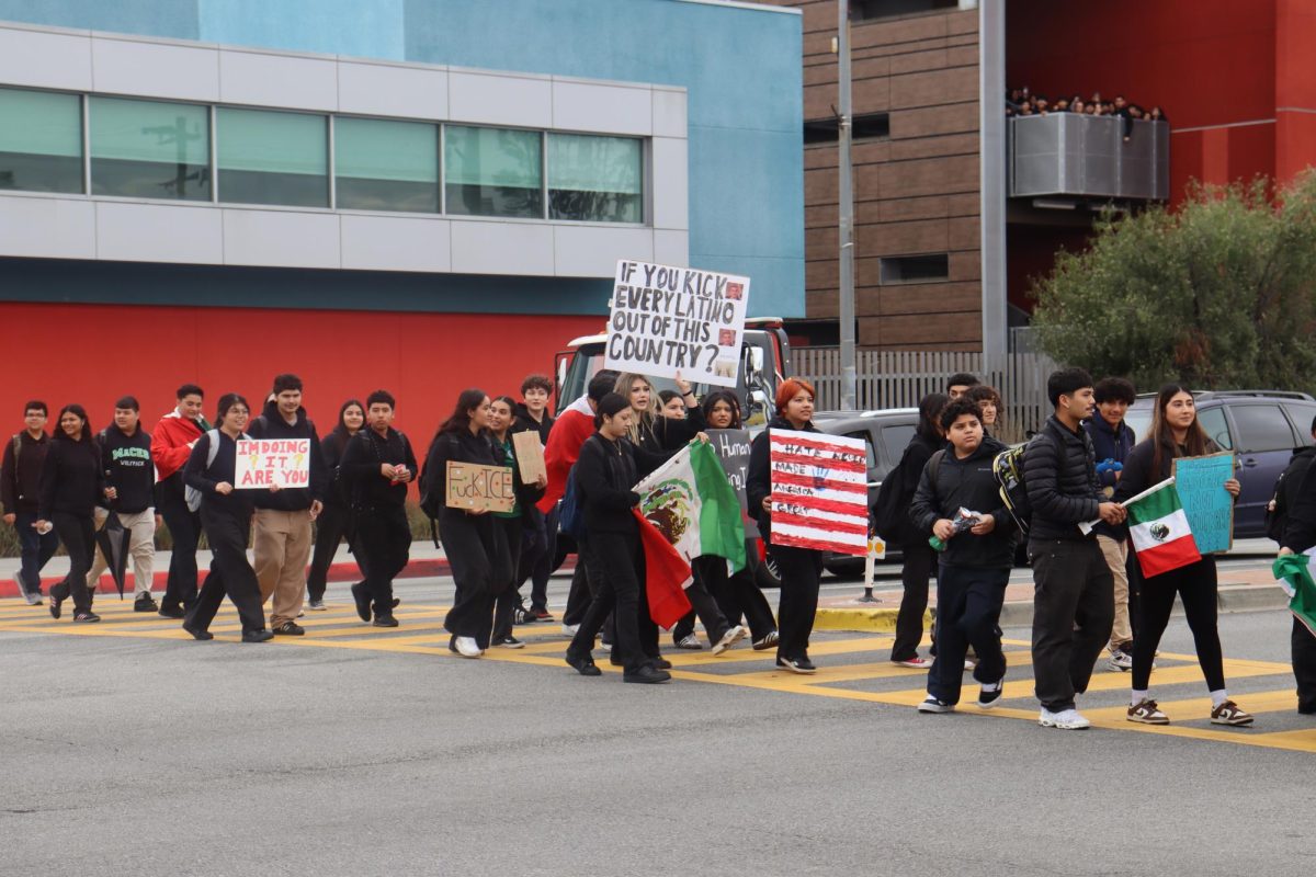 FROM CLASSROOM TO PROTEST - MACES students walked out of their classrooms on February 7 holding many flags representing their cultures and posters with many political messages written on them. They organized a walkout in protest of Trump's mass deportation policies that have been taking place since the beginning of his second term. They headed towards Plaza Azeala in South Gate where they met up with other nearby schools such as South Gate High School, Bell High School, Maywood High School, and South East High School.