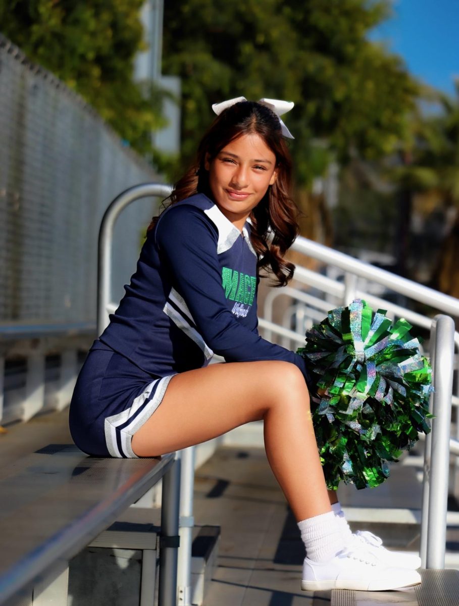 Senior Emily Ruiz, captain of the cheer team at MACES