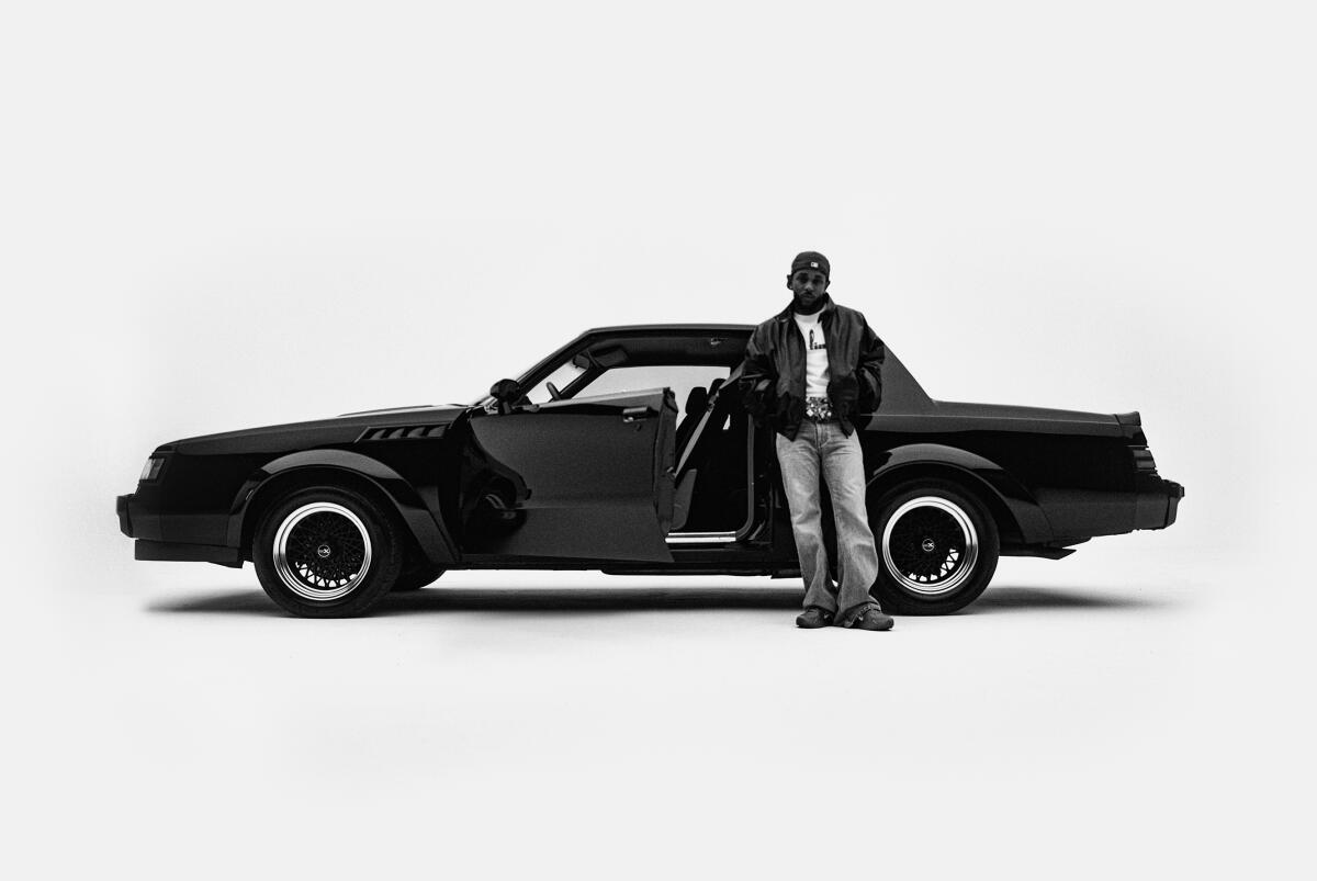 Kendrick Lamar poses in front of a Grand National GNX for the promotion of his album 'GNX'