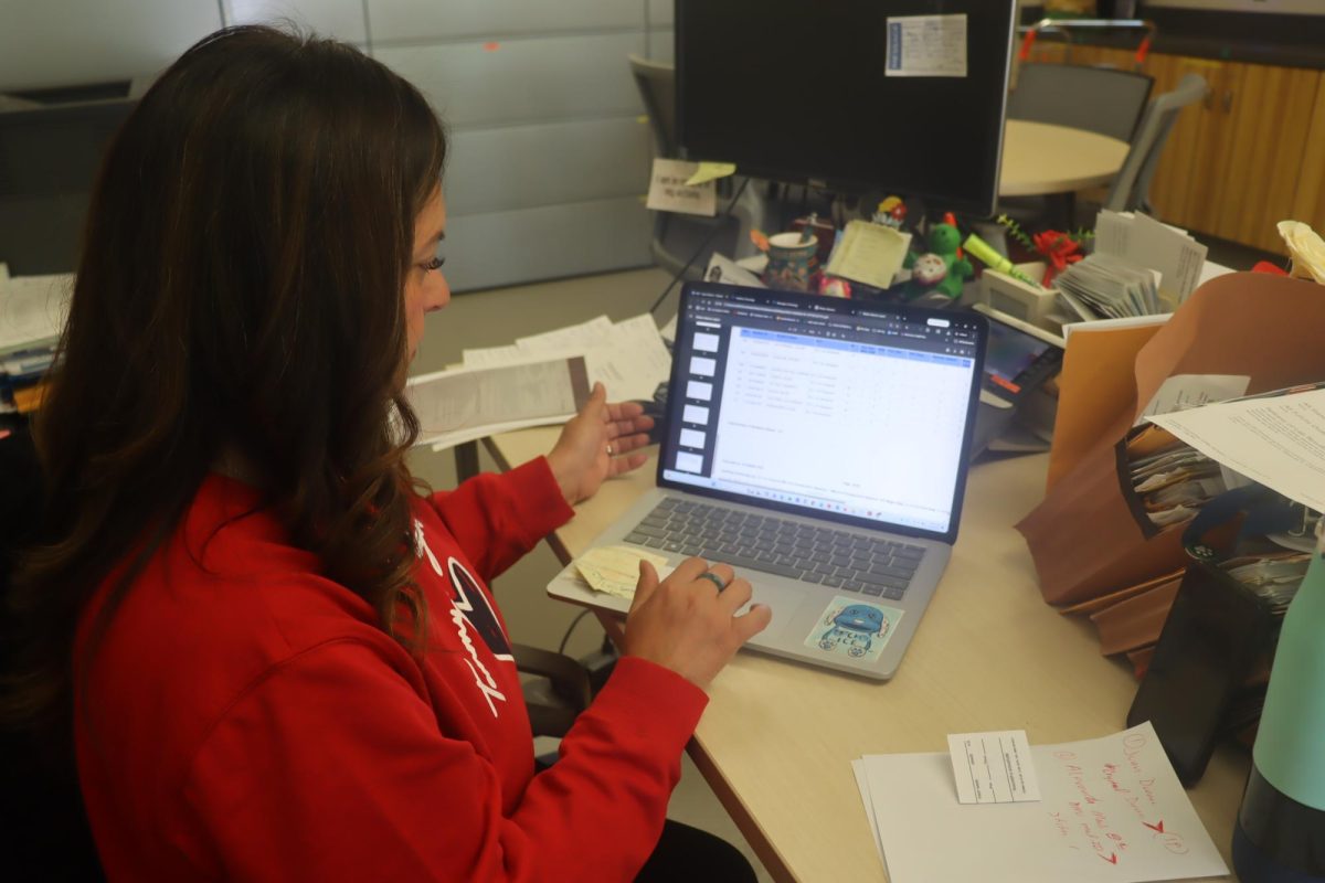 Ms. Tapia checking the data of students missing, 311 students were missing Tuesday April 14th believing that the teacher strike would happen